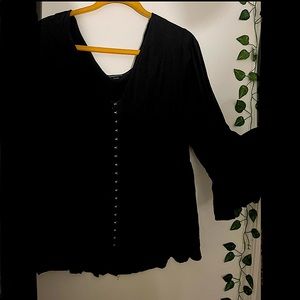 Woman’s Torrid bell sleeve metal button up black top